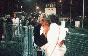 Two women hug, cry at their reunion at the Wall