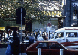 Easterners before a West Berlin bank