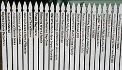 personalized pickets on fence