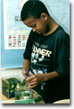 Student assembling an AquaBaby during the AquaBabies Classroom Study