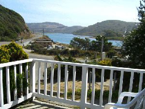 Jenner Inn & Cottages - Honeysuckle Creekside Room Patio View