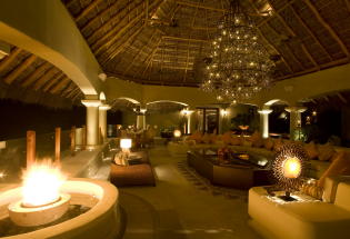 Enormous thatched palapa with estrella chandelier