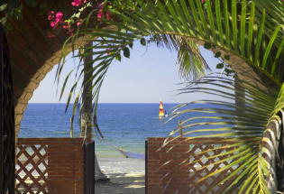 Looking out over pool to beach and bay.