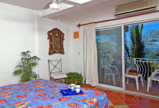 Guest Bedroom with balcony.