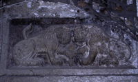Lion relief over second gate.