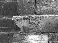 Fragment of inscription in exterior of qiblah wall.