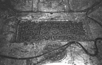 Inscribed roundel and waqf inscription.
