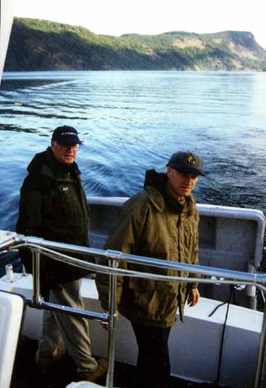 picture of bill and will ross on a boat