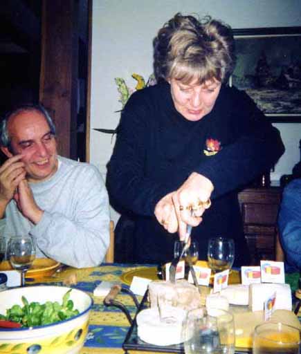 picture of vera meneclier cutting the cheese